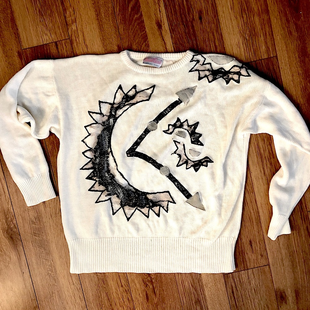 Vintage fabulous distressed pullover with black and silver appliqués